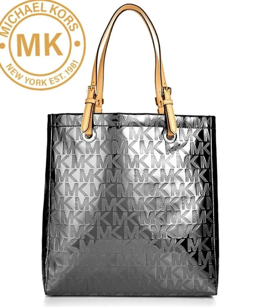 MICHAEL KORS Metallic Pewter Mirror Logo PVC & Leather North South Jet Set Tote - Picture 1 of 16